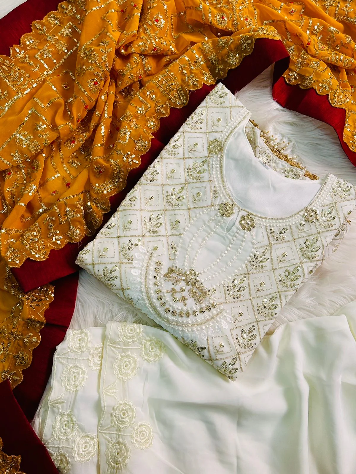 Embroidered georgette suit with embroidered dupatta and moti latkan - Image 10